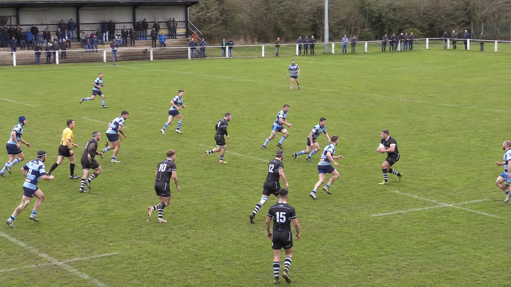 Two club rugby teams contesting a breakdown during a match